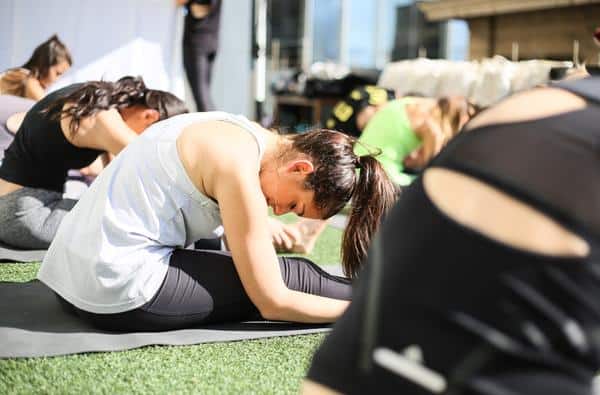 rooftop poolside yoga